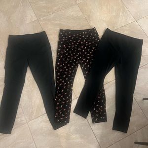 3 Cabi leggings. Black, floral and grey. Like new. Size medium.